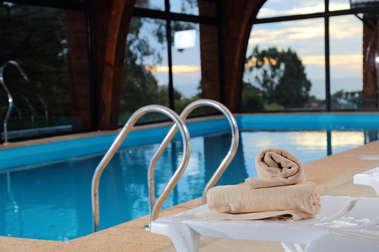 Cabanas Y Spa Costa Patagonia - Piscina Climatizada 皮奇勒姆 外观 照片